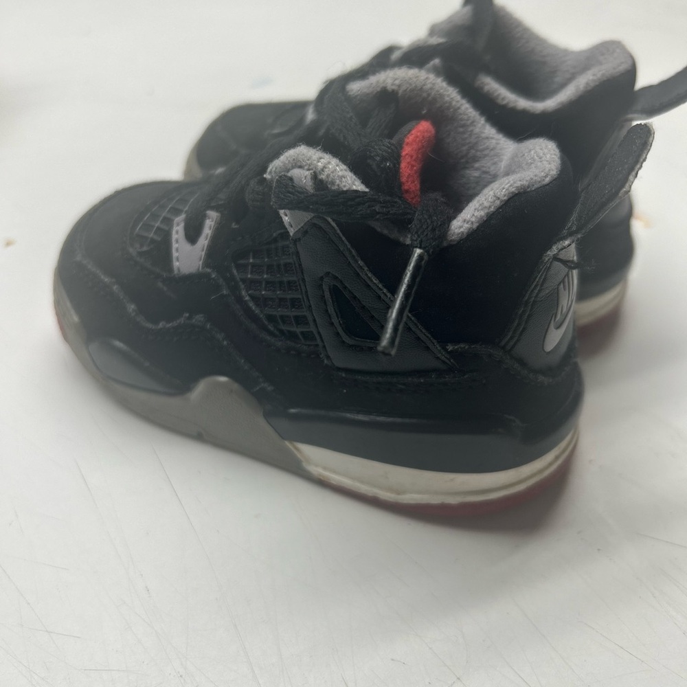Nike Black and Red Sneakers with Athletic Design